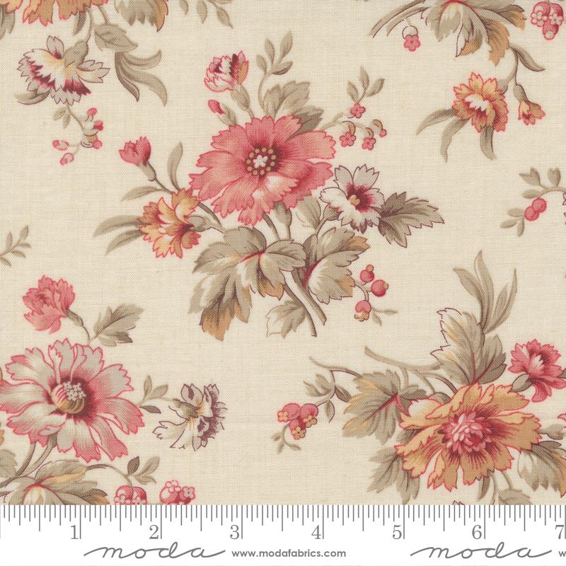 Floral fabric pattern with a ruler for scale on a beige background