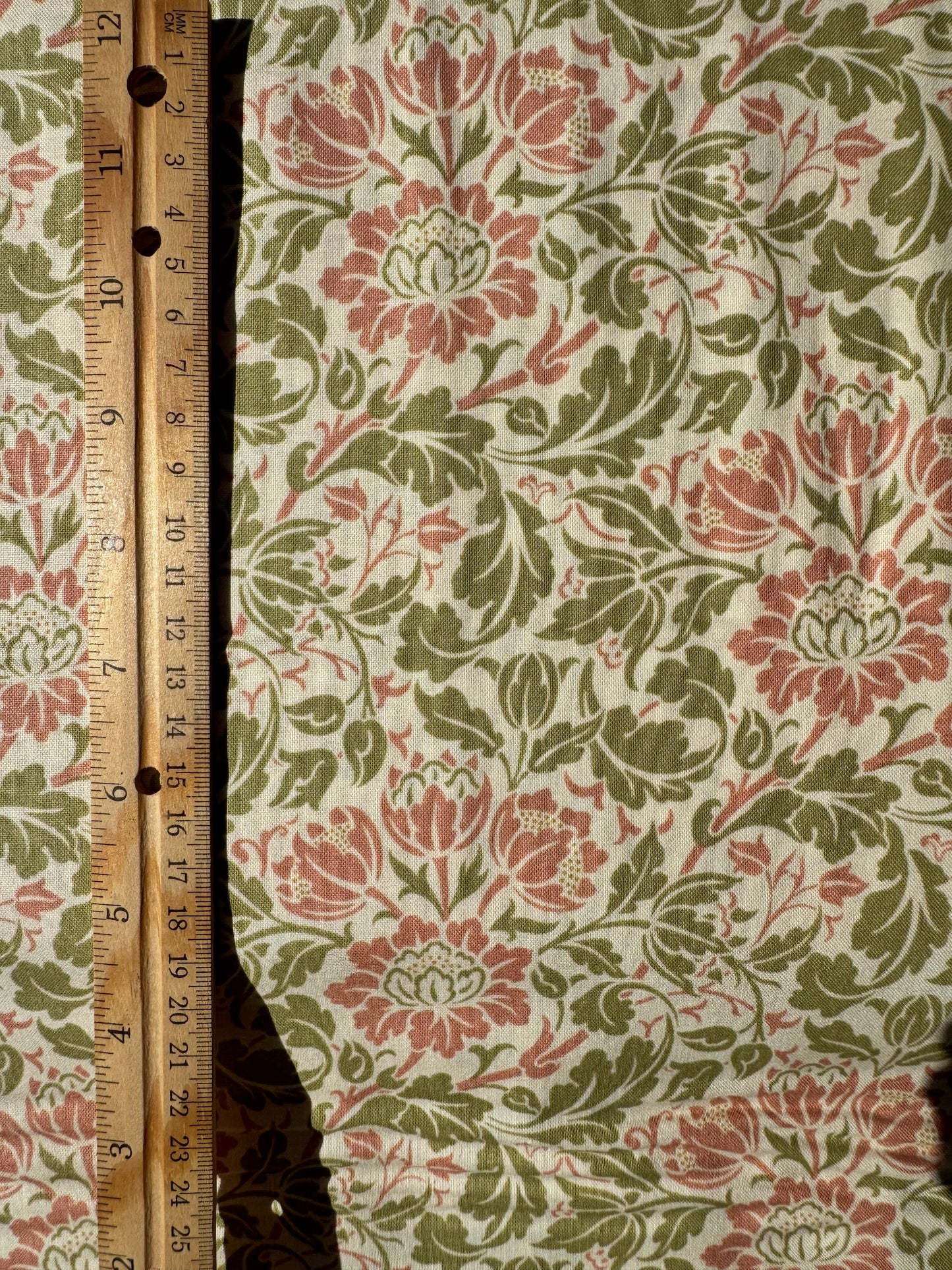 Floral patterned fabric with a ruler for scale