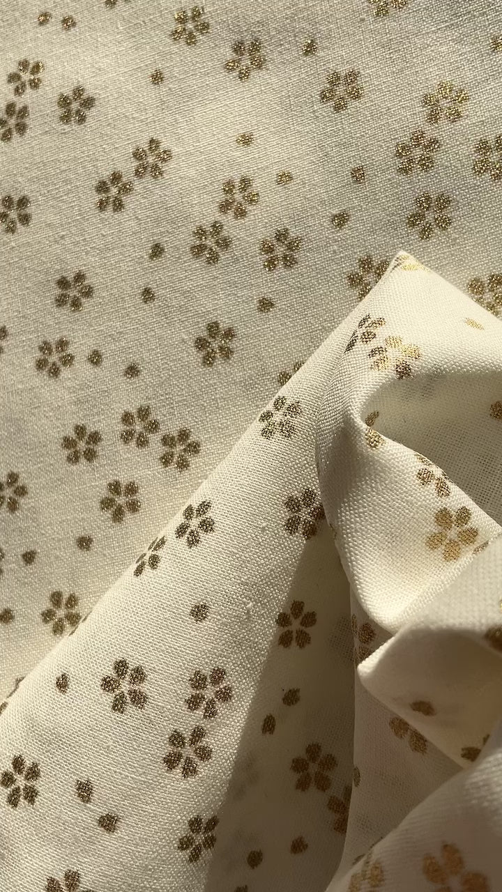 Metallic gold floral pattern on white background.  100% premium cotton fabric for quilting, patchwork, dressmaking and other crafts